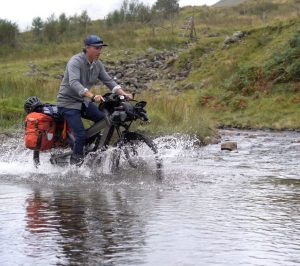 man-on-bike-in-water.jpg