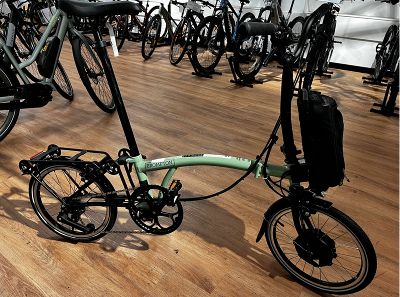 Brompton Ex-Demo Electric C Line 4-Speed Mid HB 2024 W/ Rack in Matcha Green-1